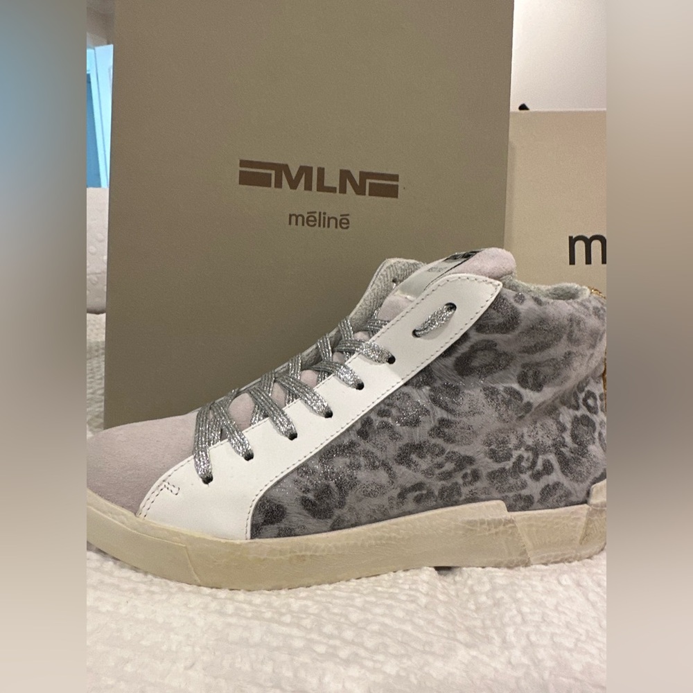 Meline Sneakers. Grey Animal Print. Size 7.5. Never worn before.